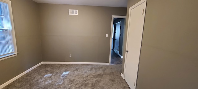 view of carpeted spare room