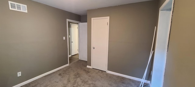 unfurnished bedroom with light carpet