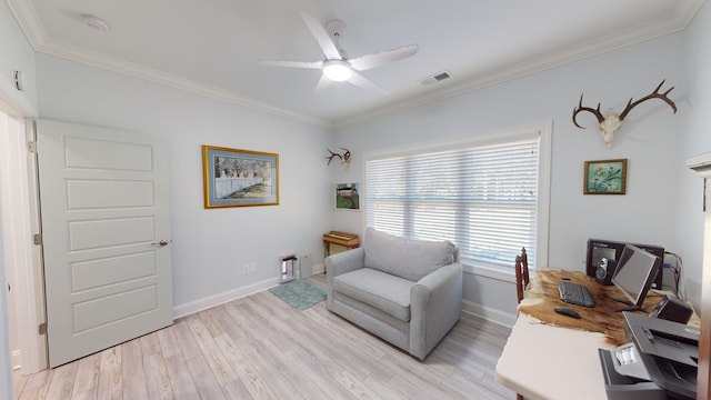 home office featuring ornamental molding, ceiling fan, and light hardwood / wood-style flooring