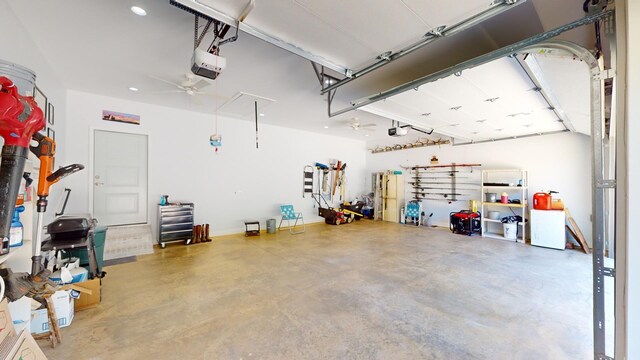 garage featuring ceiling fan and a garage door opener