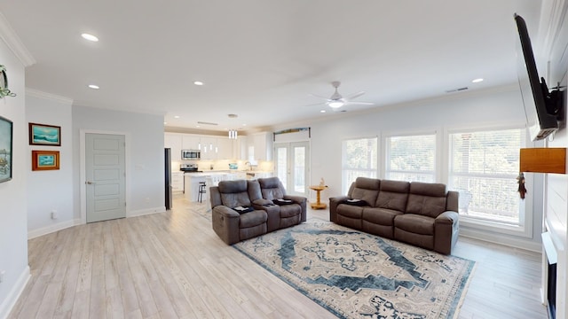 85 Breeze Pt, Savannah, TN 38372 - living room with a ceiling fan, ornamental molding, light wood-type flooring, baseboards, and recessed lighting
