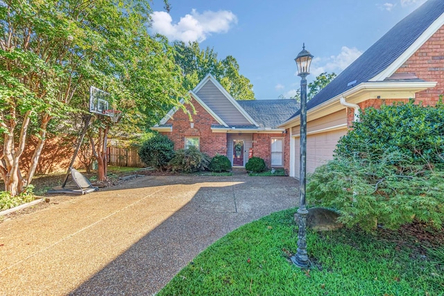 view of front of property with a garage