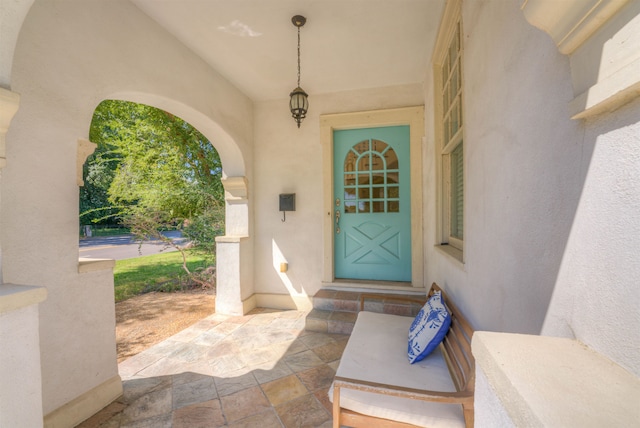 entrance to property with a porch