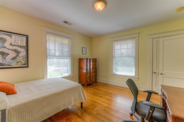 bedroom featuring light wood-type flooring