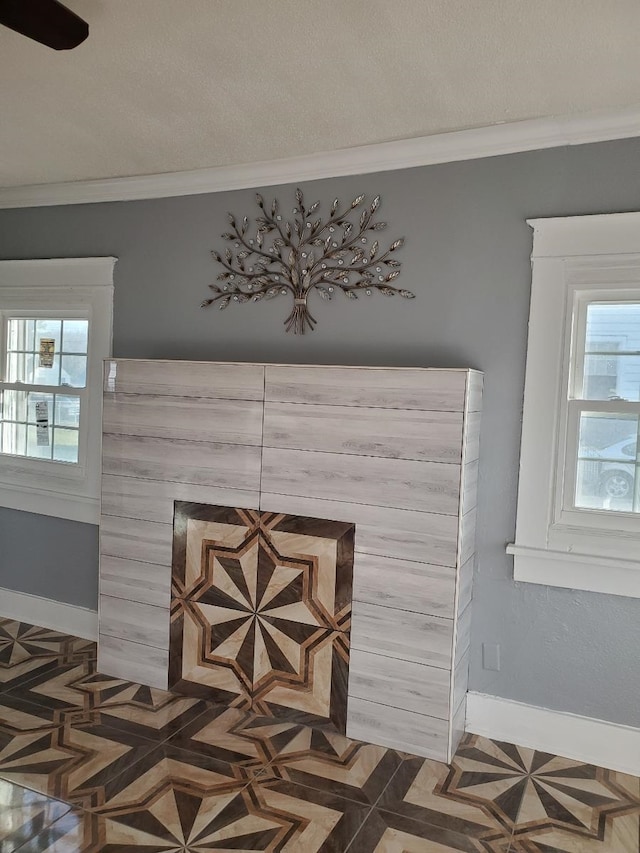 room details featuring ornamental molding and parquet floors