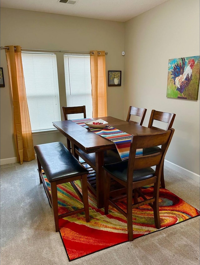 view of carpeted dining room