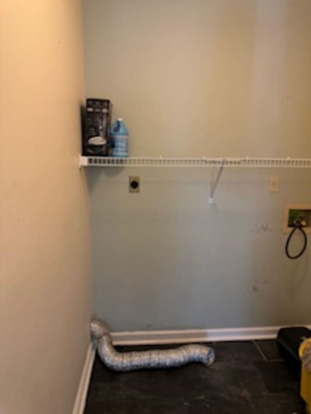 washroom with hookup for a washing machine and electric dryer hookup