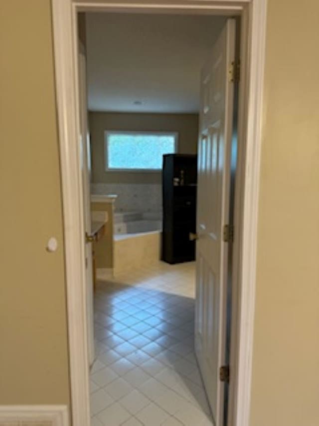 7565 Wintergreen Ln NW, Tn, TN 38018 - corridor featuring light tile patterned flooring