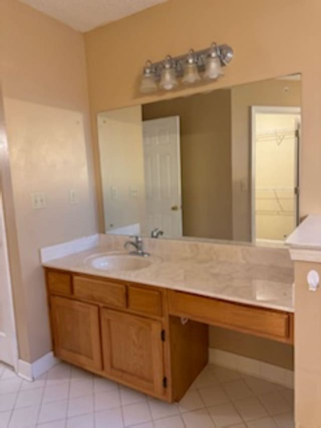 bathroom featuring vanity and tile patterned floors