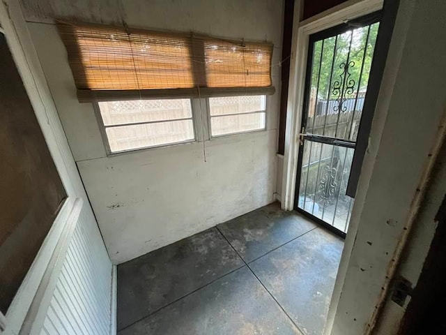 entryway with concrete flooring