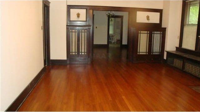 interior space with dark hardwood / wood-style flooring