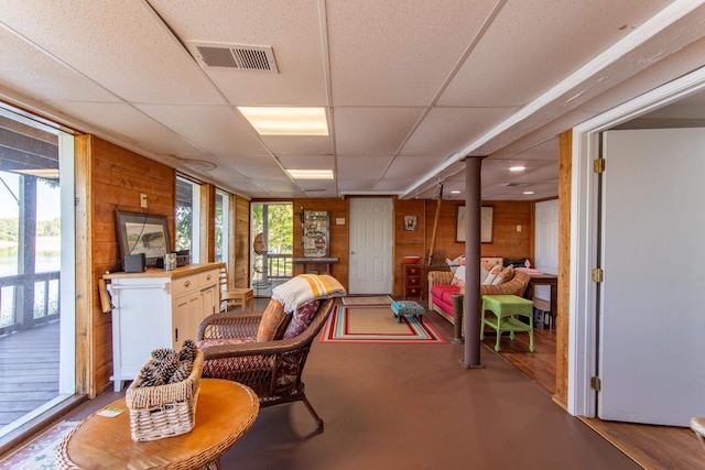 interior space featuring a paneled ceiling