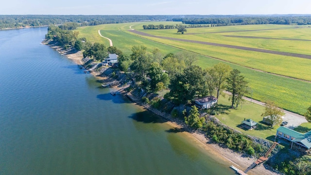 drone / aerial view featuring a rural view and a water view