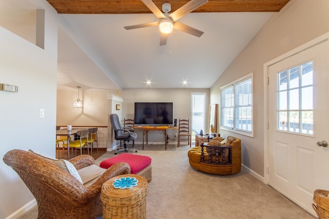 living room featuring ceiling fan, vaulted ceiling with beams, and carpet