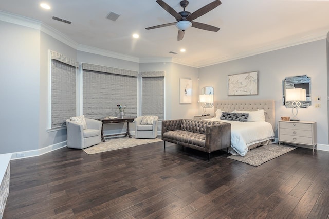 bedroom featuring ornamental molding, dark hardwood / wood-style flooring, and ceiling fan