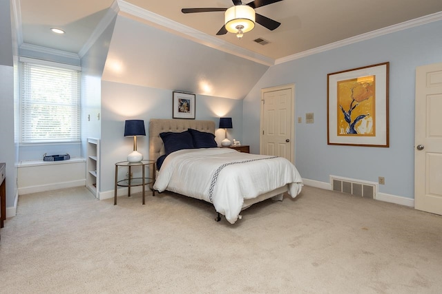 bedroom with ornamental molding, light carpet, ceiling fan, and vaulted ceiling