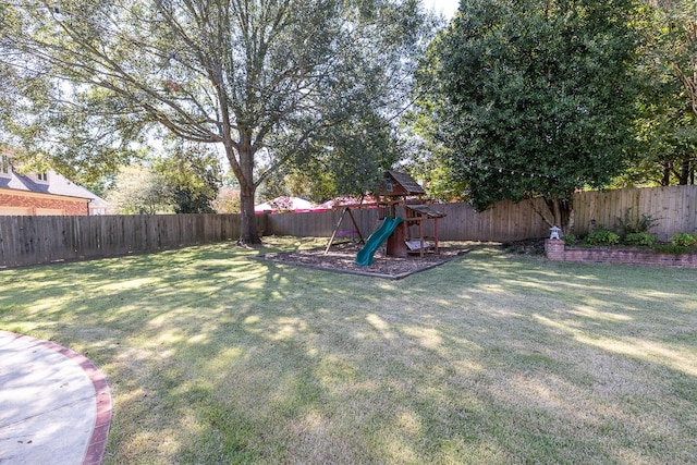 view of yard with a playground