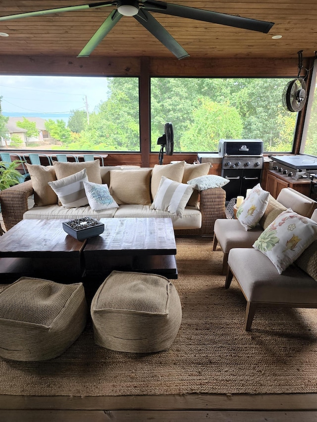 view of patio with ceiling fan and grilling area