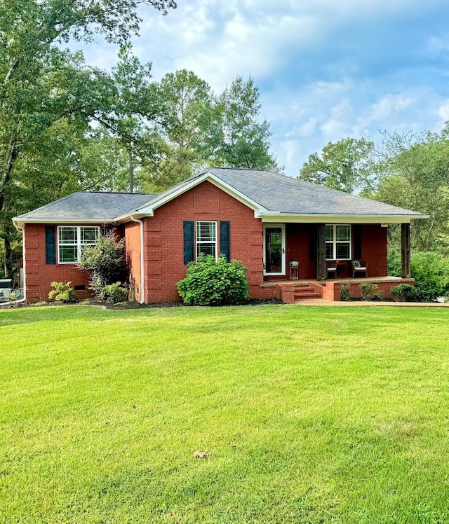 ranch-style home with a front yard