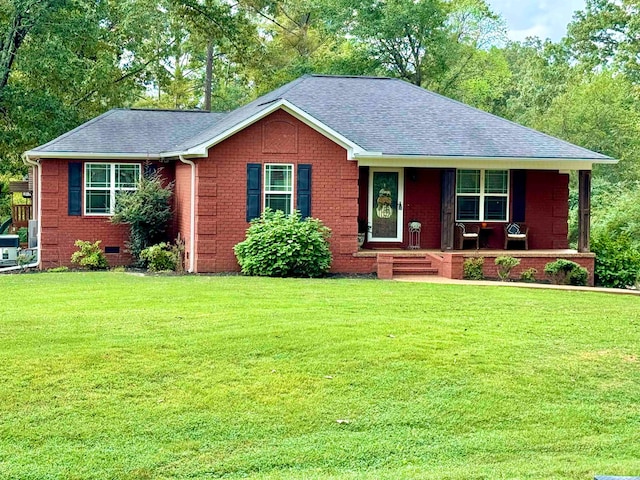 ranch-style house featuring a front lawn and a porch