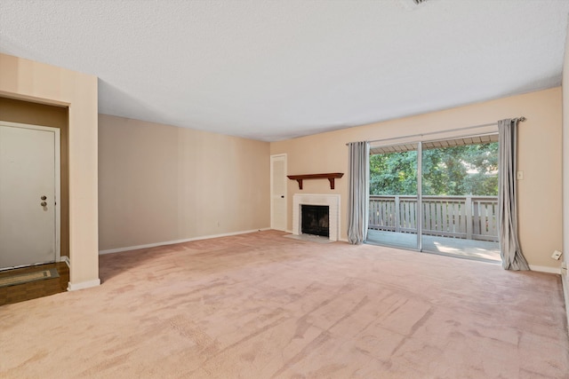 unfurnished living room with light carpet