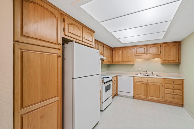 kitchen with white appliances and sink