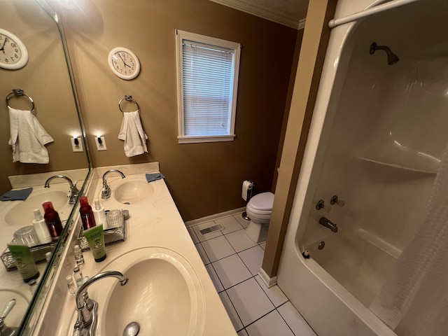 full bathroom featuring toilet, tile patterned flooring, crown molding,  shower combination, and vanity