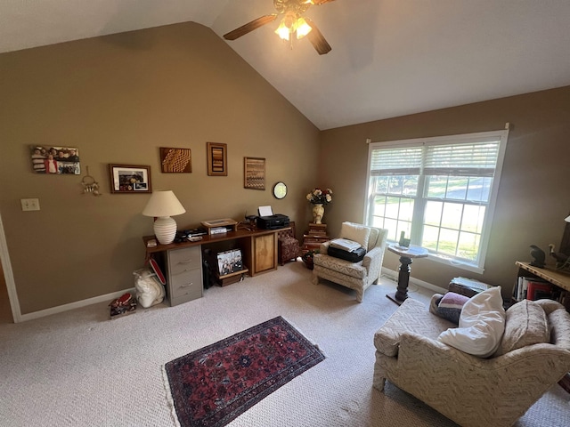 carpeted living room with high vaulted ceiling and ceiling fan