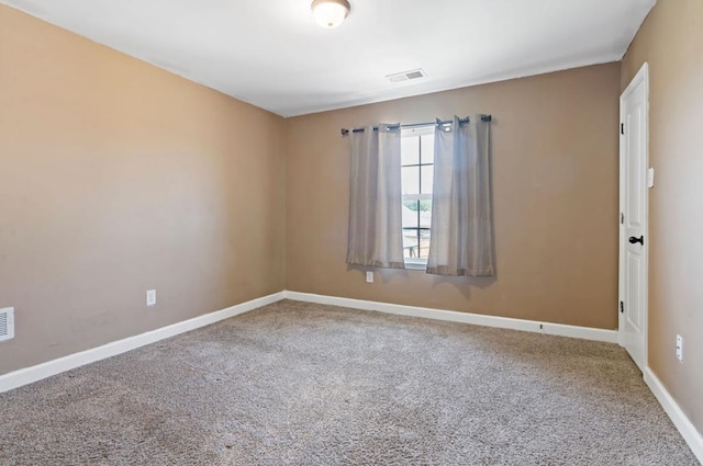 unfurnished room with carpet