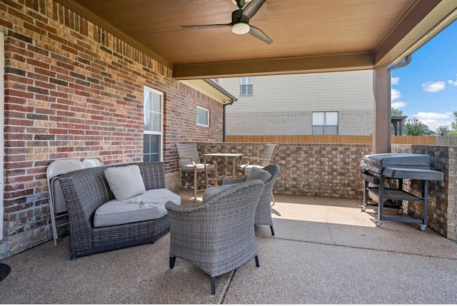 view of patio / terrace with ceiling fan and a grill