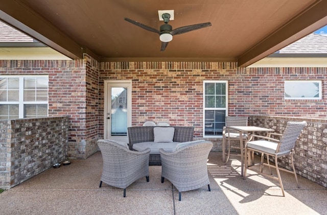 view of patio featuring ceiling fan