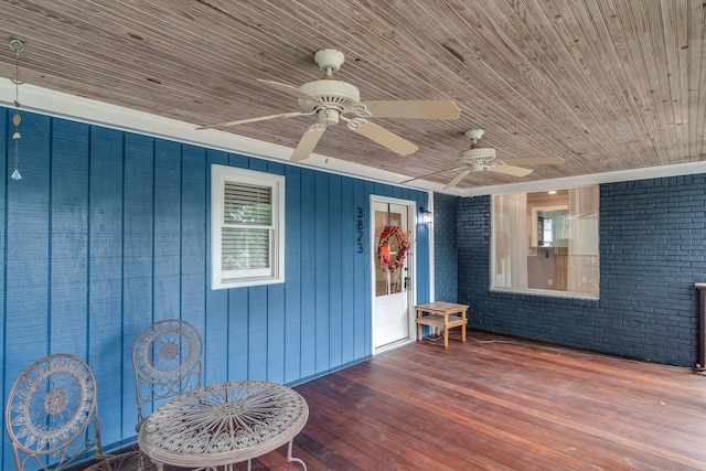 exterior space with ceiling fan