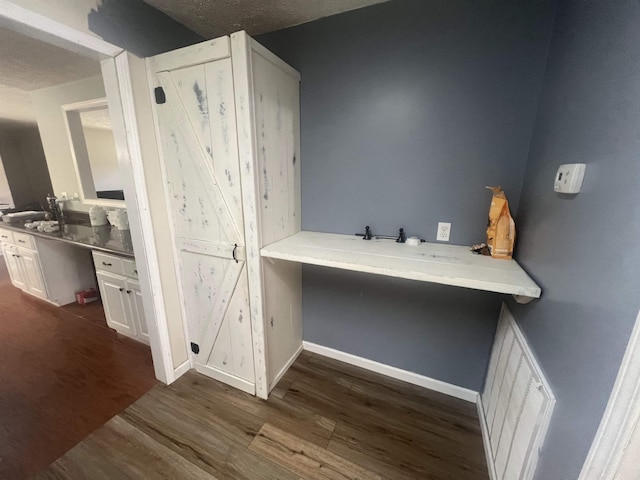 1405 Hurricane Dr, Sardis, TN 38371 - interior space featuring baseboards and dark wood finished floors