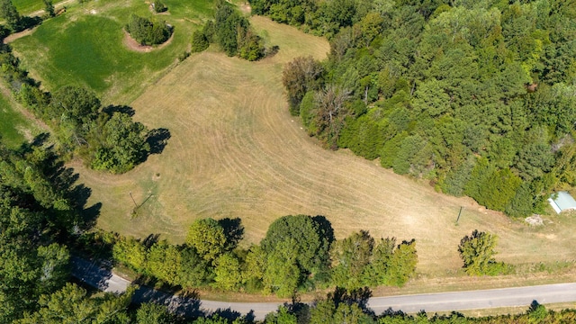 birds eye view of property featuring a rural view