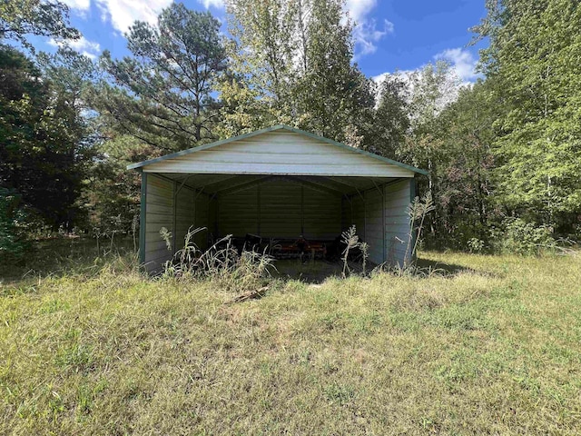1405 Hurricane Dr, Sardis, TN 38371 - view of outbuilding with a carport