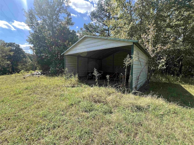 1405 Hurricane Dr, Sardis, TN 38371 - view of outdoor structure featuring a carport