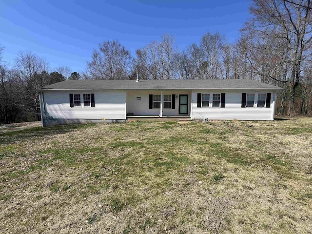 1405 Hurricane Dr, Sardis, TN 38371 - ranch-style house featuring a front yard