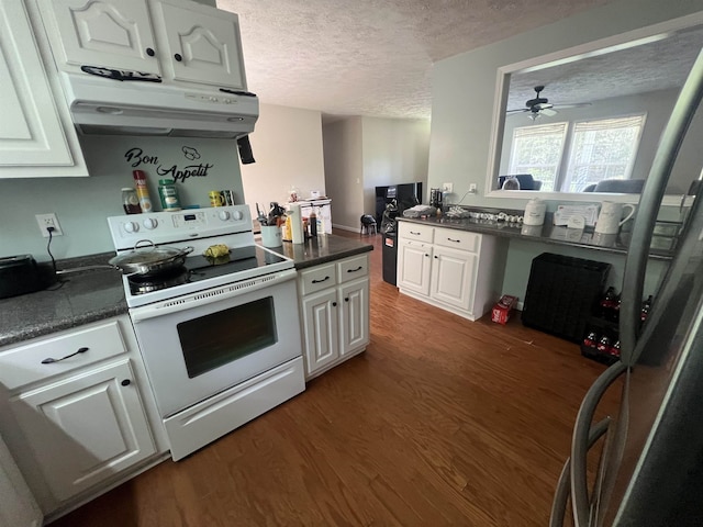 kitchen featuring ceiling fan, a textured ceiling, white cabinetry, dark hardwood / wood-style floors, and electric range