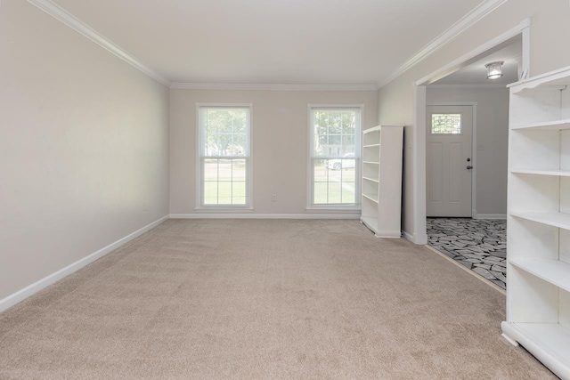 unfurnished room with light colored carpet and ornamental molding