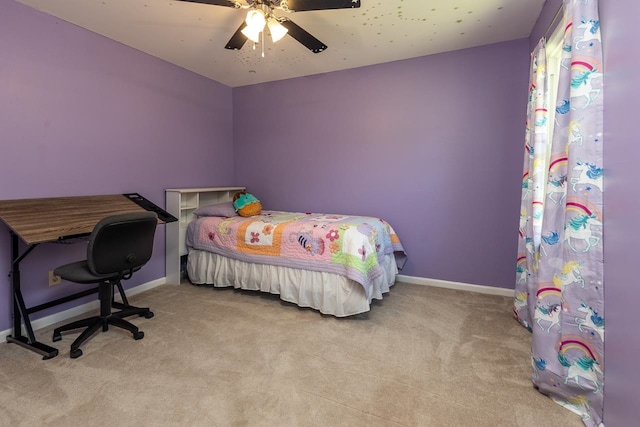 bedroom featuring ceiling fan and light colored carpet