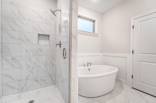 bathroom with shower with separate bathtub