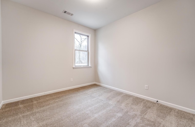 view of carpeted spare room