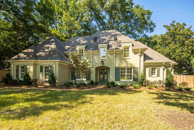 4938 Barfield Rd, Memphis, TN 38117 - french country home featuring fence, stucco siding, and french doors
