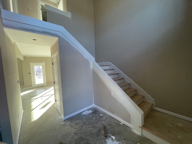 stairway with baseboards