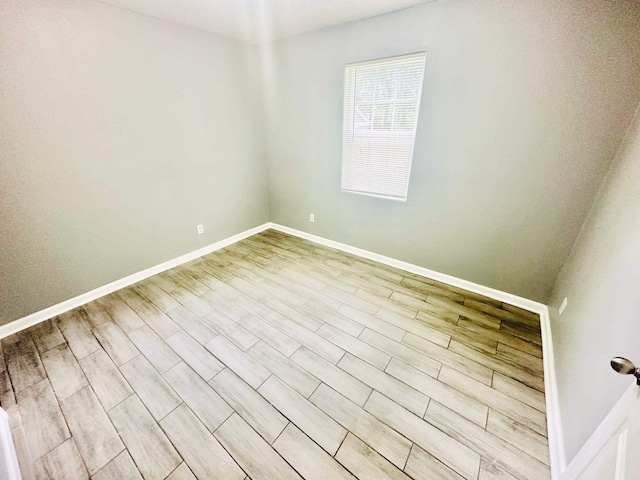 empty room featuring light hardwood / wood-style floors