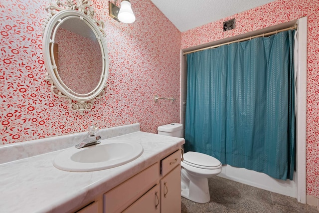 full bathroom featuring vanity, shower / tub combo, toilet, and a textured ceiling