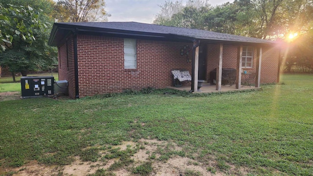 exterior space featuring a yard and a patio area