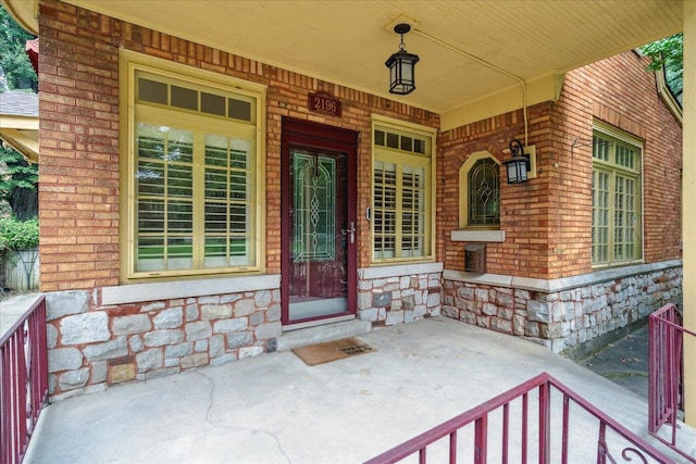 entrance to property with covered porch