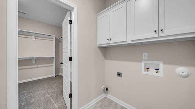 laundry room featuring cabinets, carpet, washer hookup, and hookup for an electric dryer