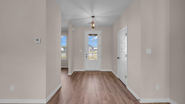 entryway with light hardwood / wood-style floors